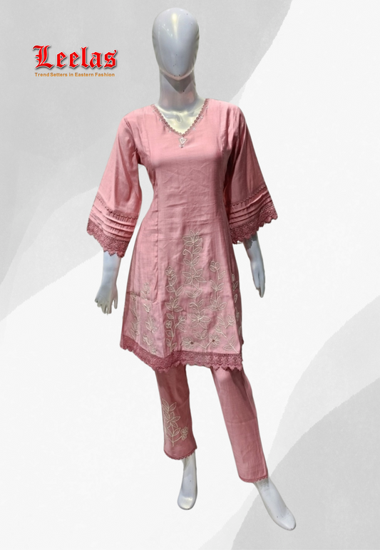 Mink cotton indo western top with lace detail on neckline and sleeve and matching pink cotton pants