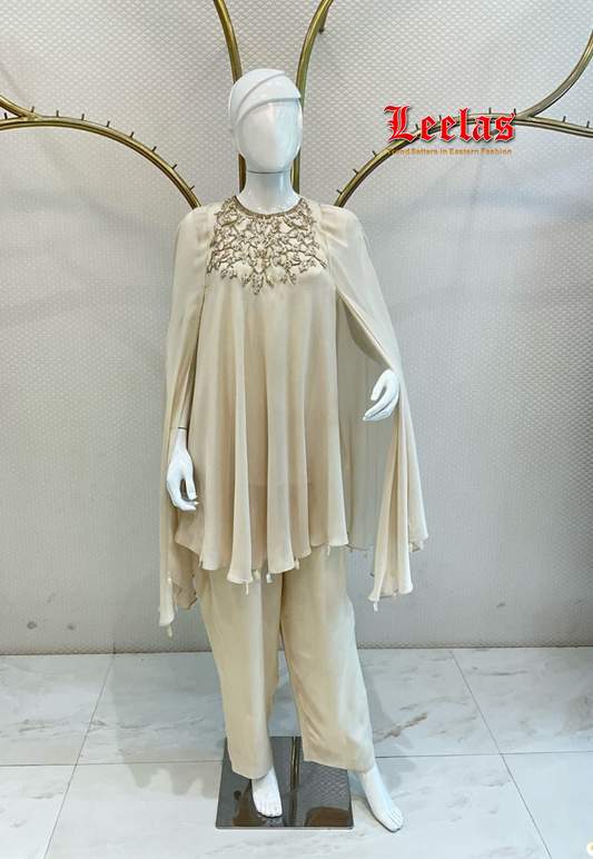 Cream silk Indo Western top and pants with motif and bead work